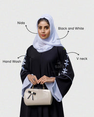 Black and white abaya